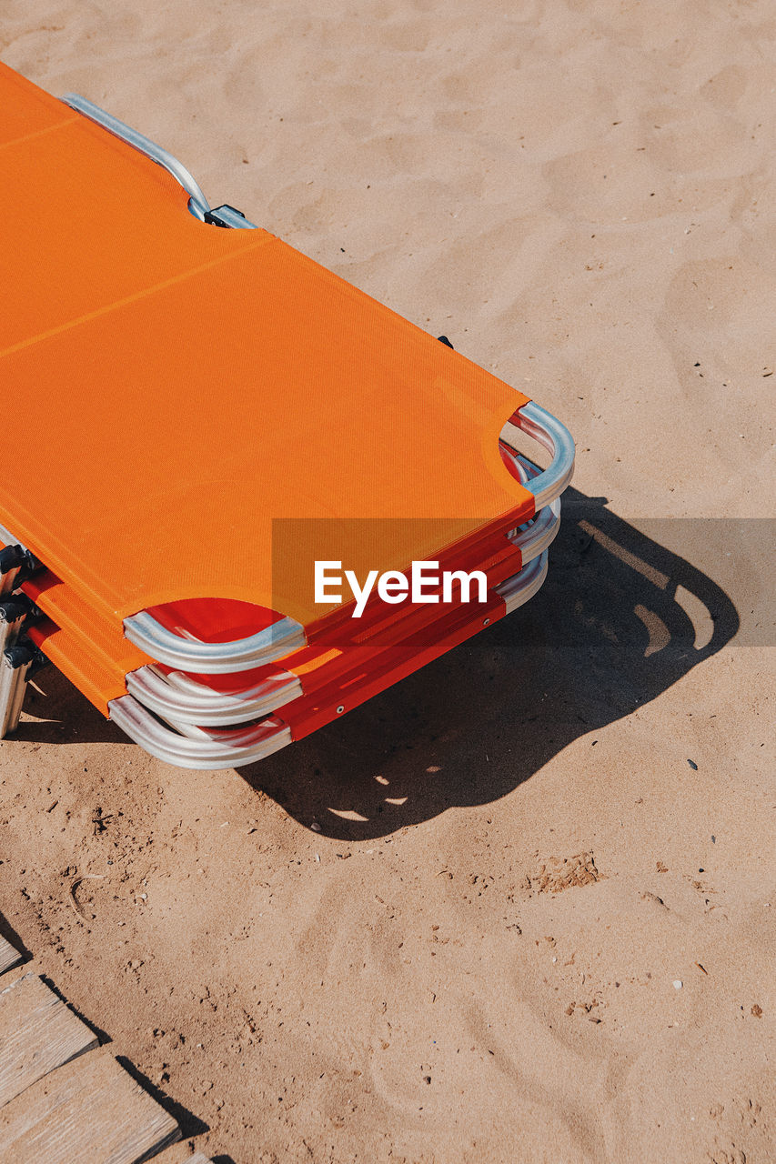 High angle view of empty beach chair