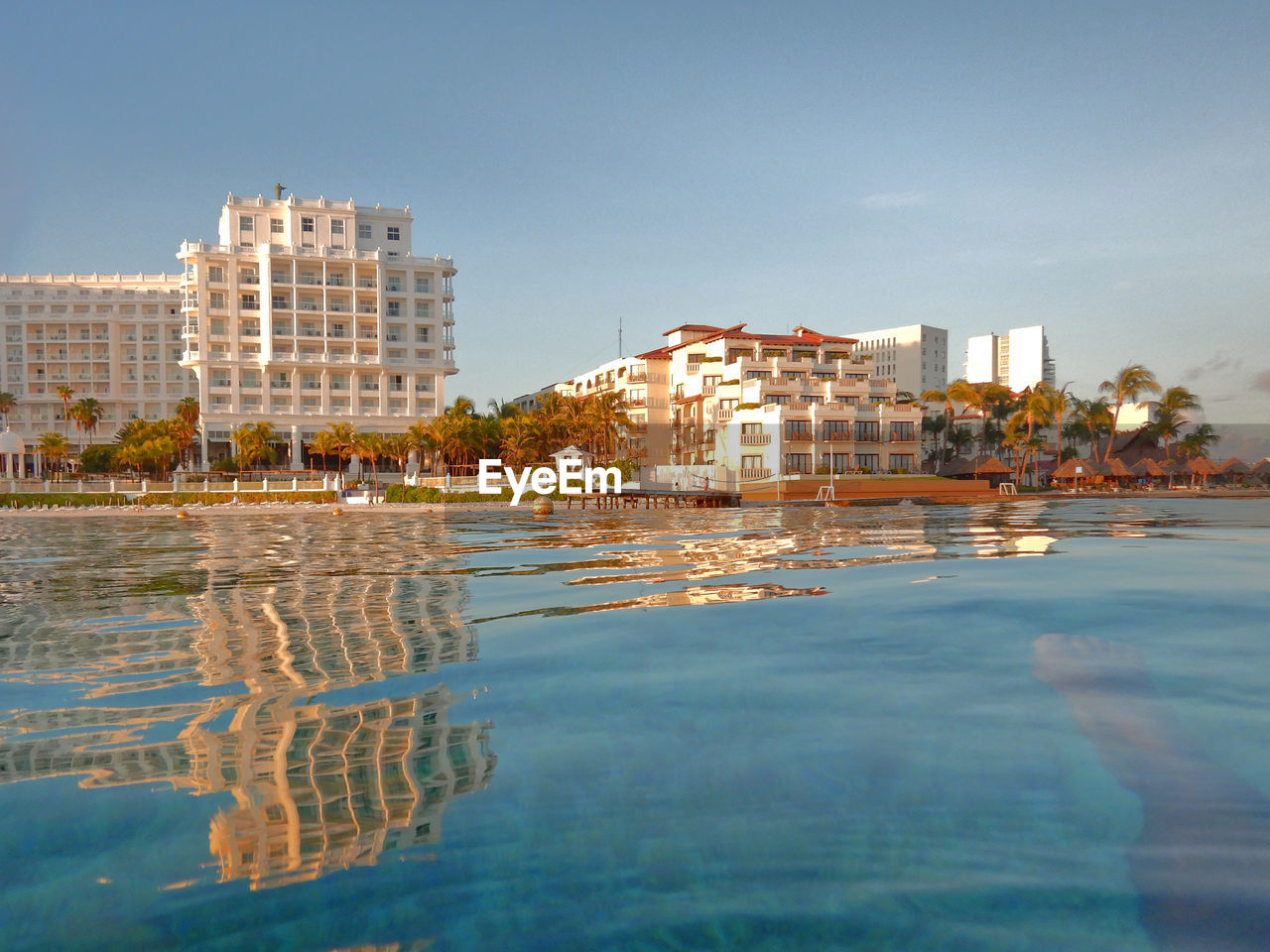 REFLECTION OF BUILDINGS ON WATER
