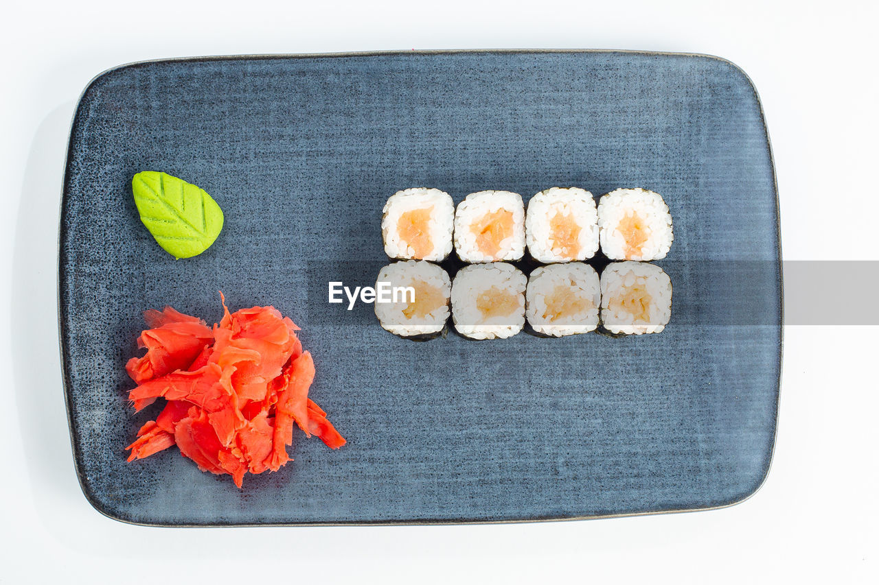 food, food and drink, freshness, healthy eating, wellbeing, studio shot, indoors, no people, white background, seafood, directly above, dish, still life, cuisine, produce, japanese food, high angle view, fast food, asian food, rice, meal, sushi, tray