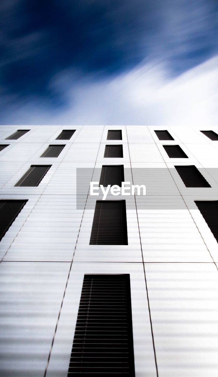 Low angle view of modern building against sky