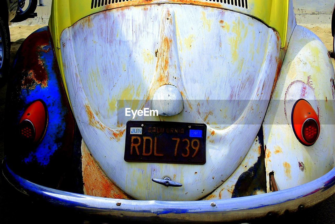 CLOSE-UP OF RUSTY TRUCK