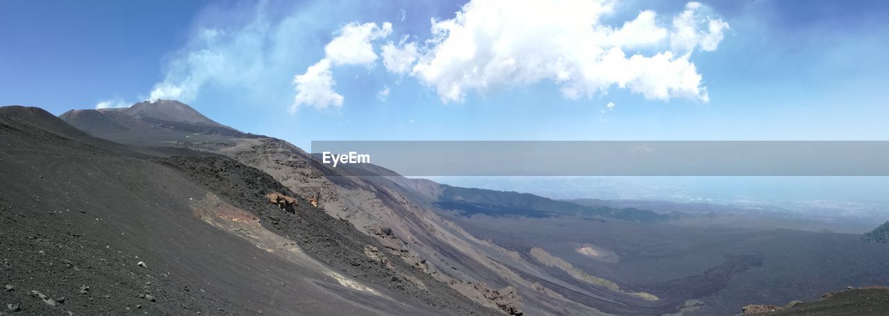 Panoramic view of mountain etna against sky