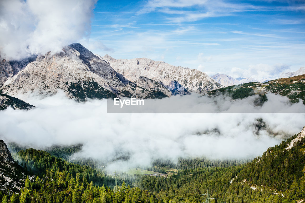 Scenic view of cloudscape over mountains