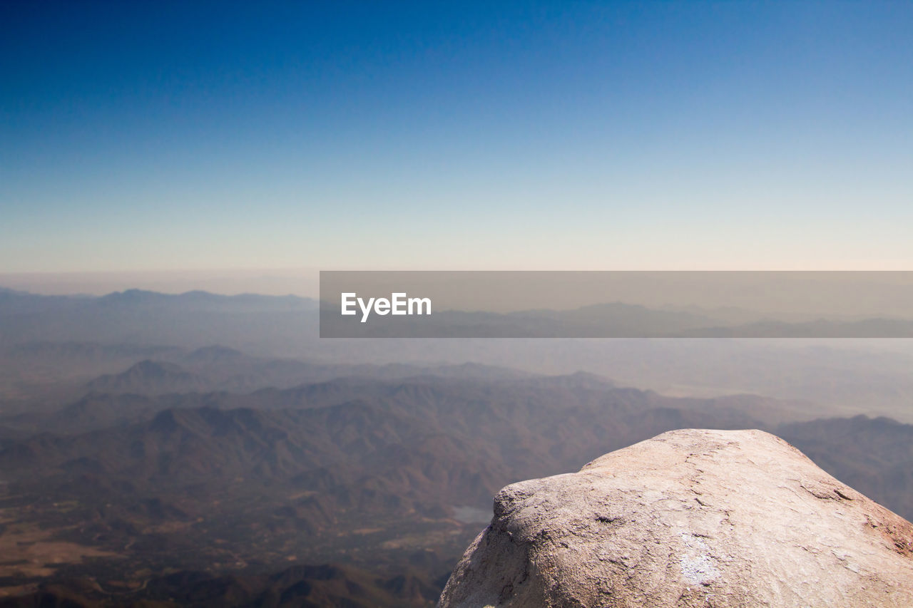 Scenic view of mountains against clear sky