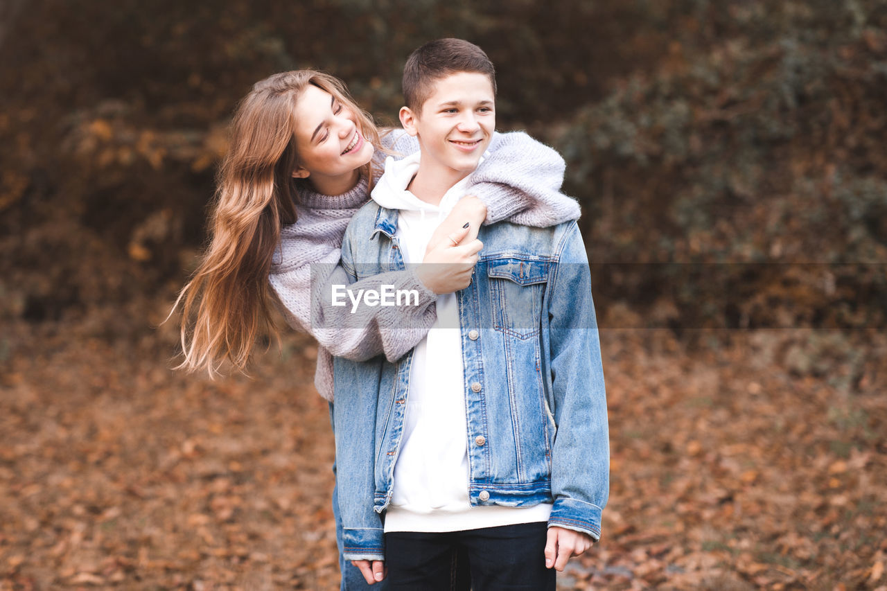 Young couple enjoying during autumn