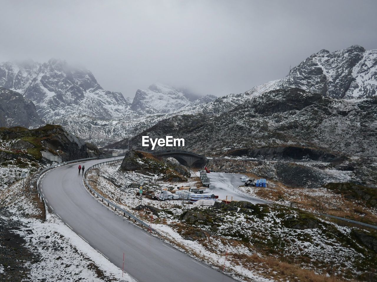 Scenic view of snowcapped mountains against sky - roadview