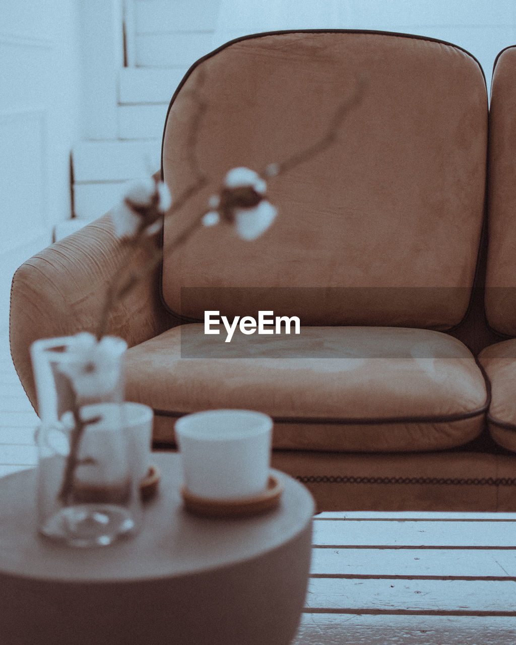 Close-up of sofa on table at home