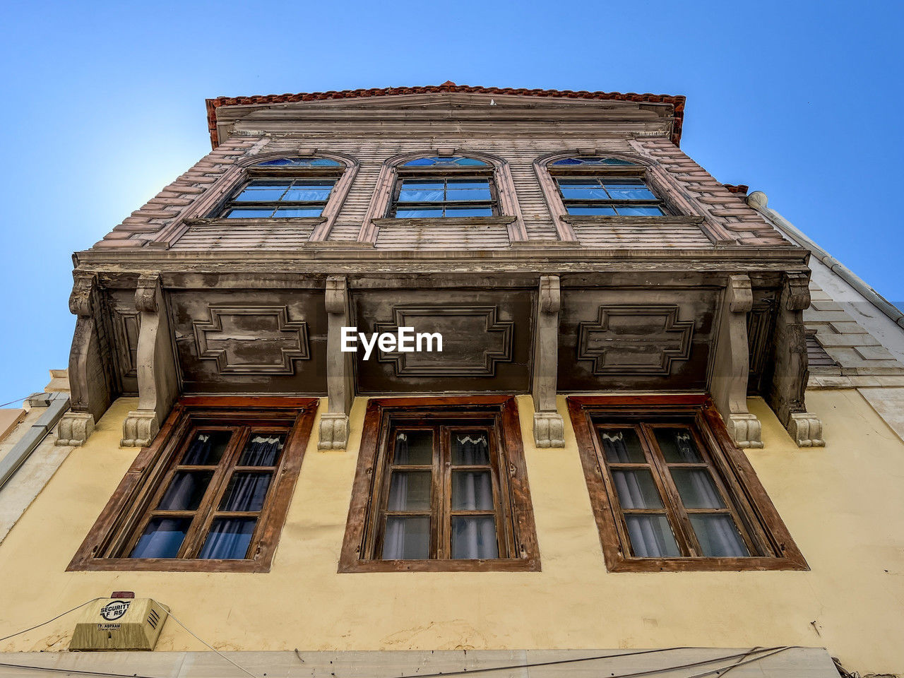 architecture, built structure, building exterior, landmark, sky, facade, clear sky, window, low angle view, blue, house, urban area, history, building, no people, the past, nature, day, city, outdoors, travel destinations, sunny