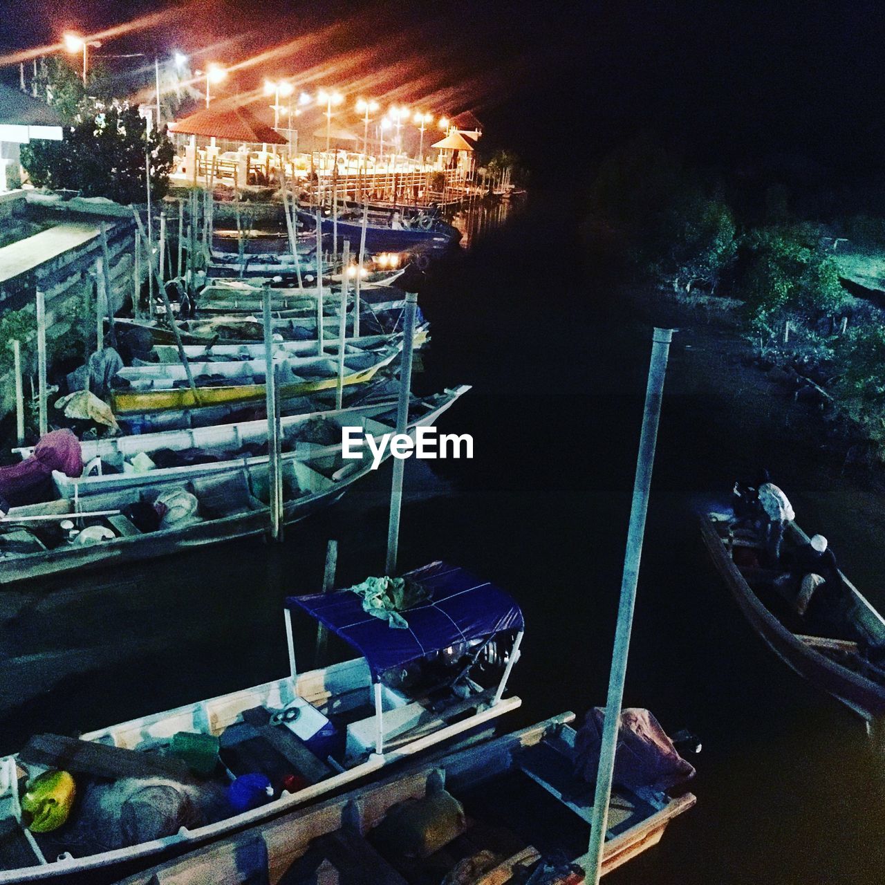 HIGH ANGLE VIEW OF ILLUMINATED MARKET FOR SALE AT NIGHT