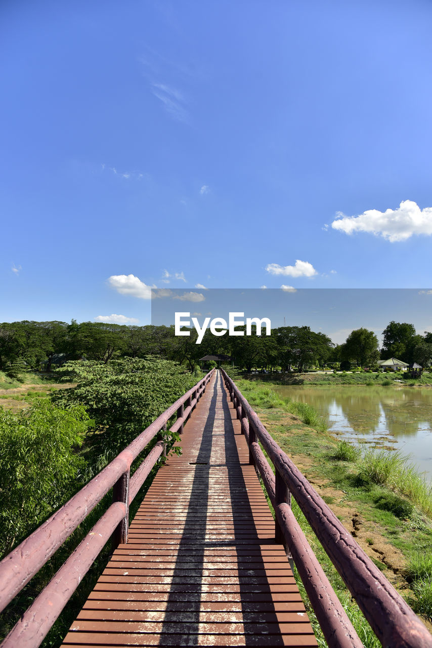 View of bridge on landscape against sky