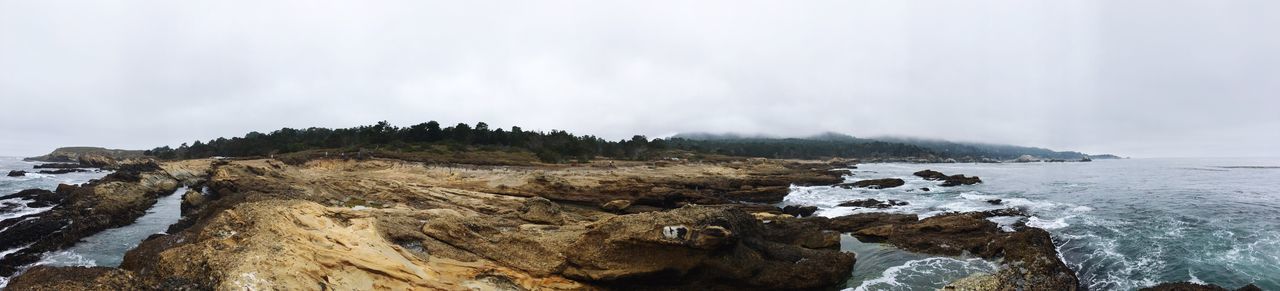 Panoramic view of sea against sky during winter