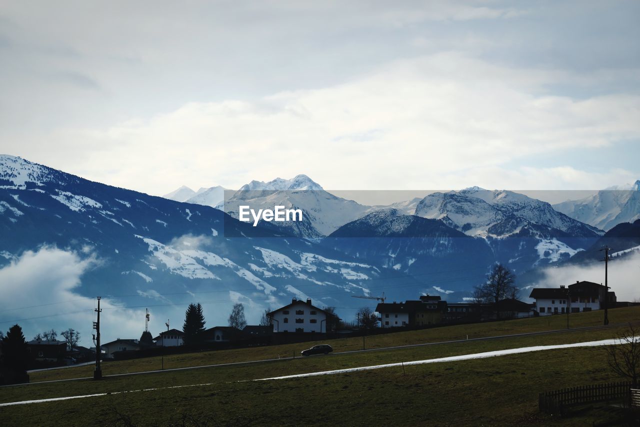 Scenic view of snowcapped mountains against sky