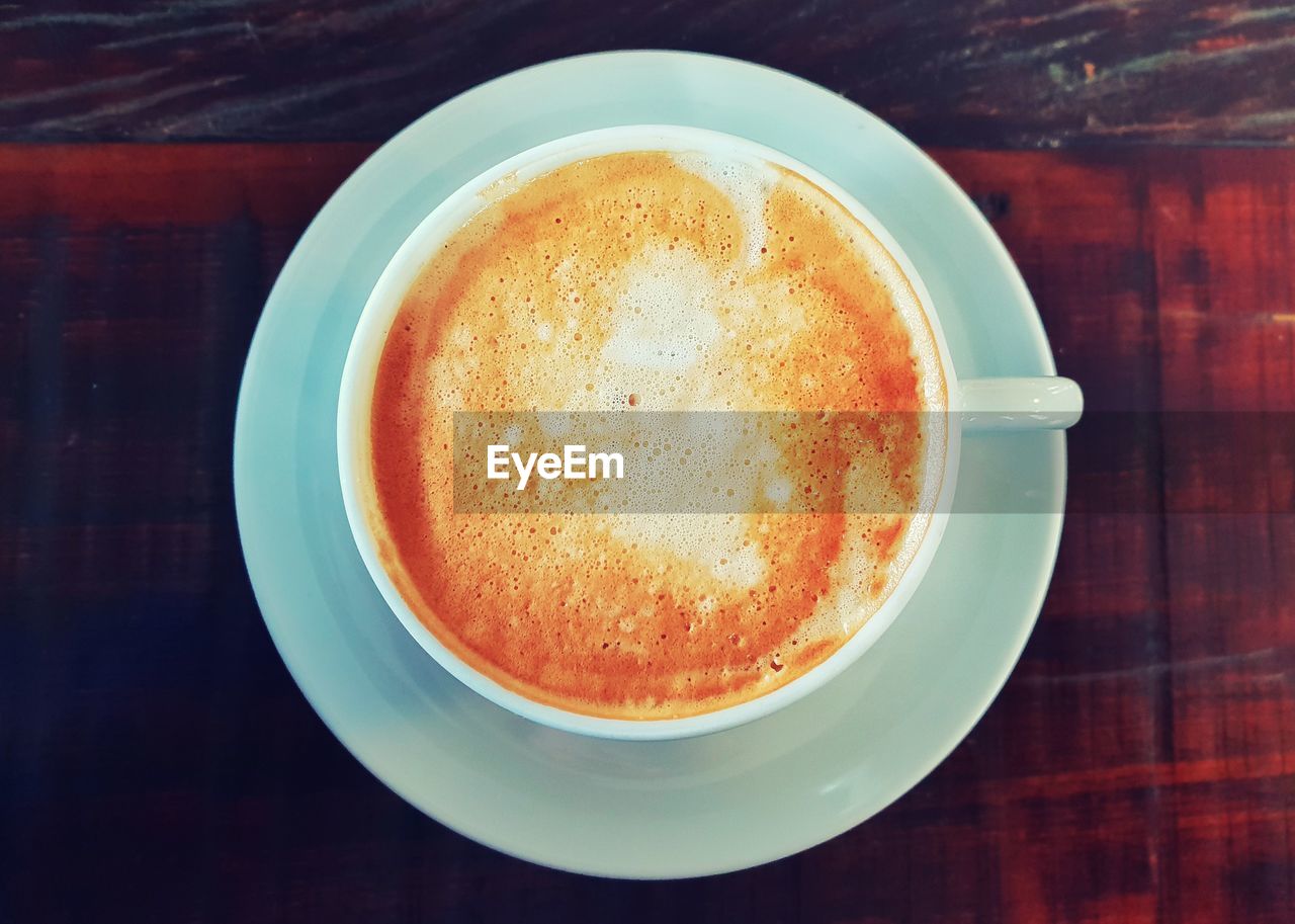 CLOSE-UP OF COFFEE ON TABLE