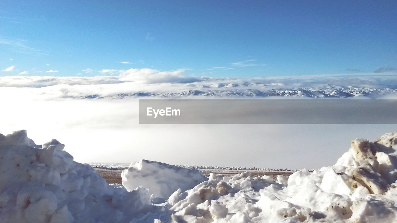 Scenic view of cloudy sky during winter