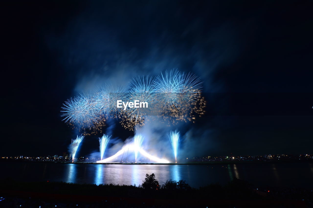 Low angle view of sky illumed with fire crackers