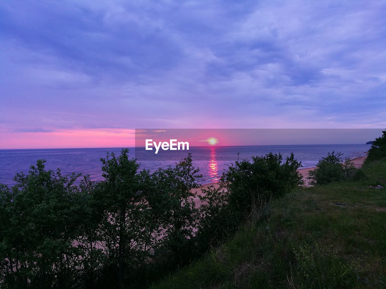 SCENIC VIEW OF SEA DURING SUNSET