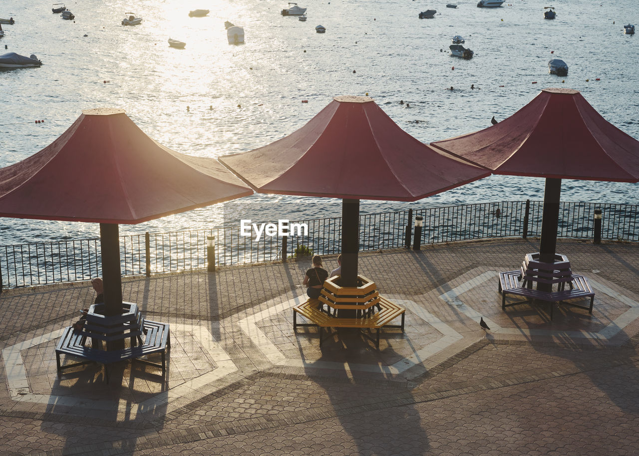 Empty chairs at beach