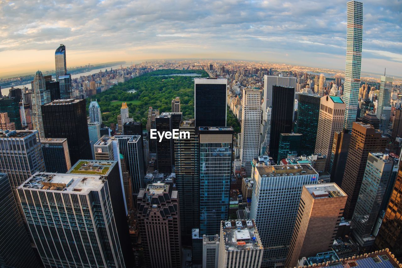 432 park avenue against cloudy sky in city