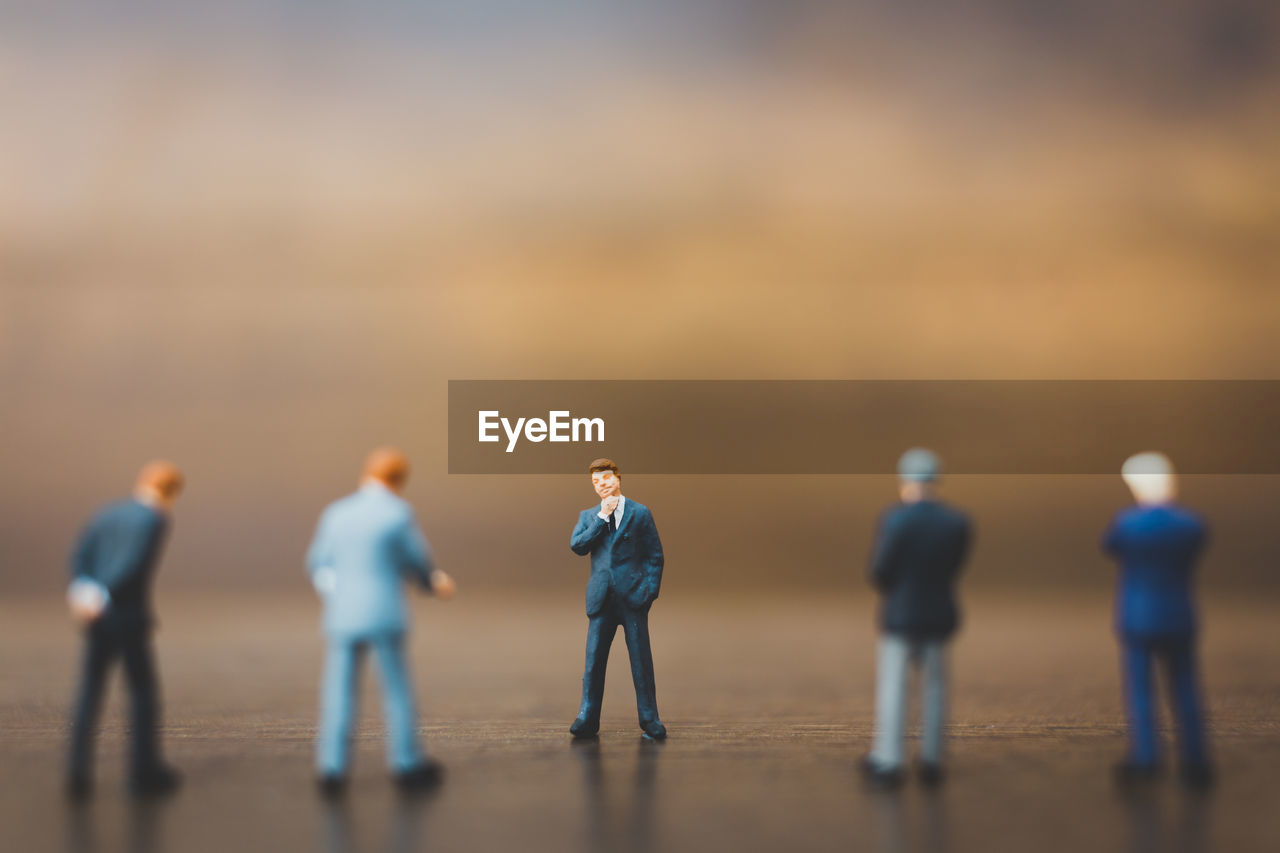 Figurines on wooden table