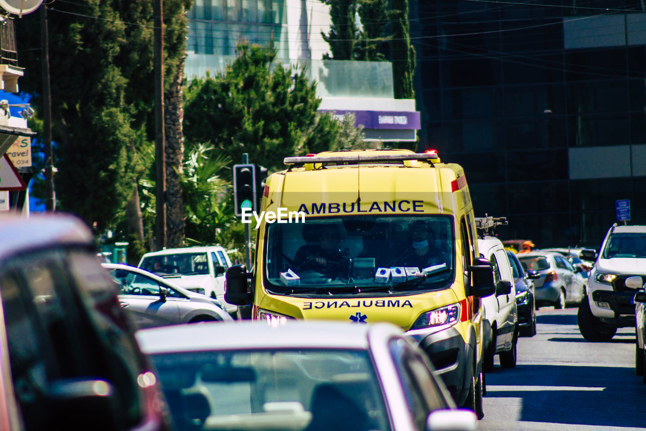 Ambulance on road in city