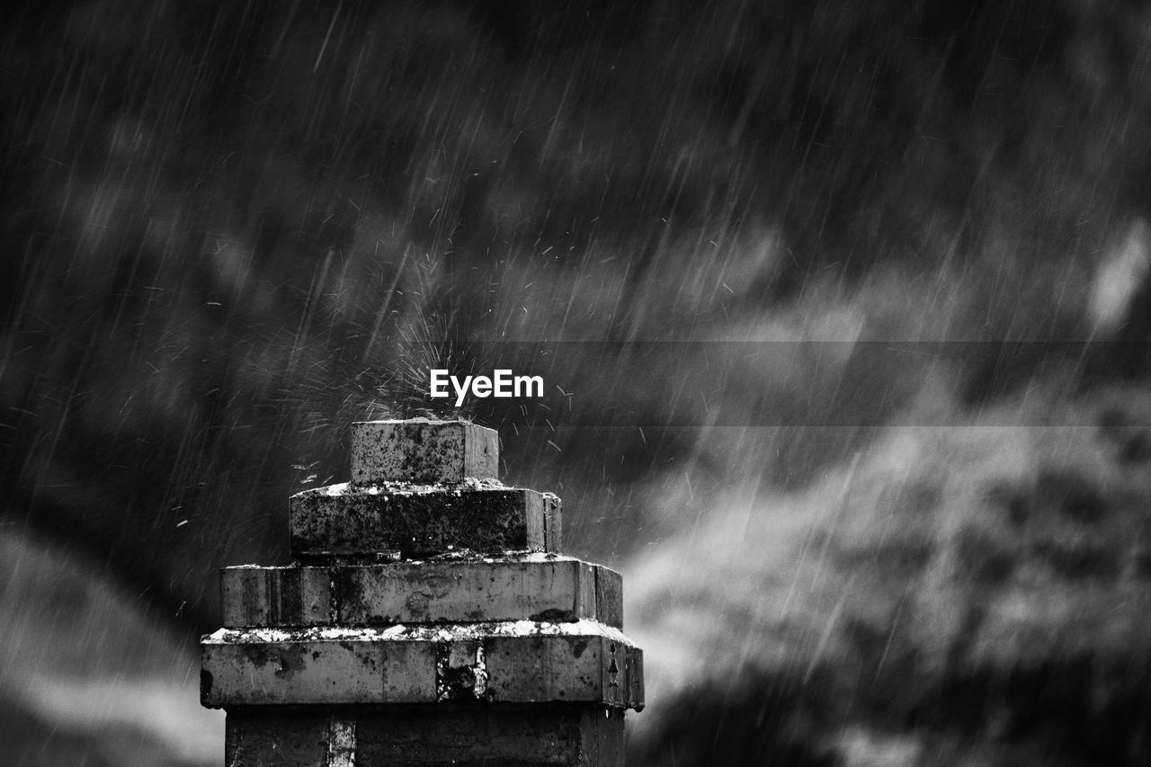 Close-up of pedestal during rainfall