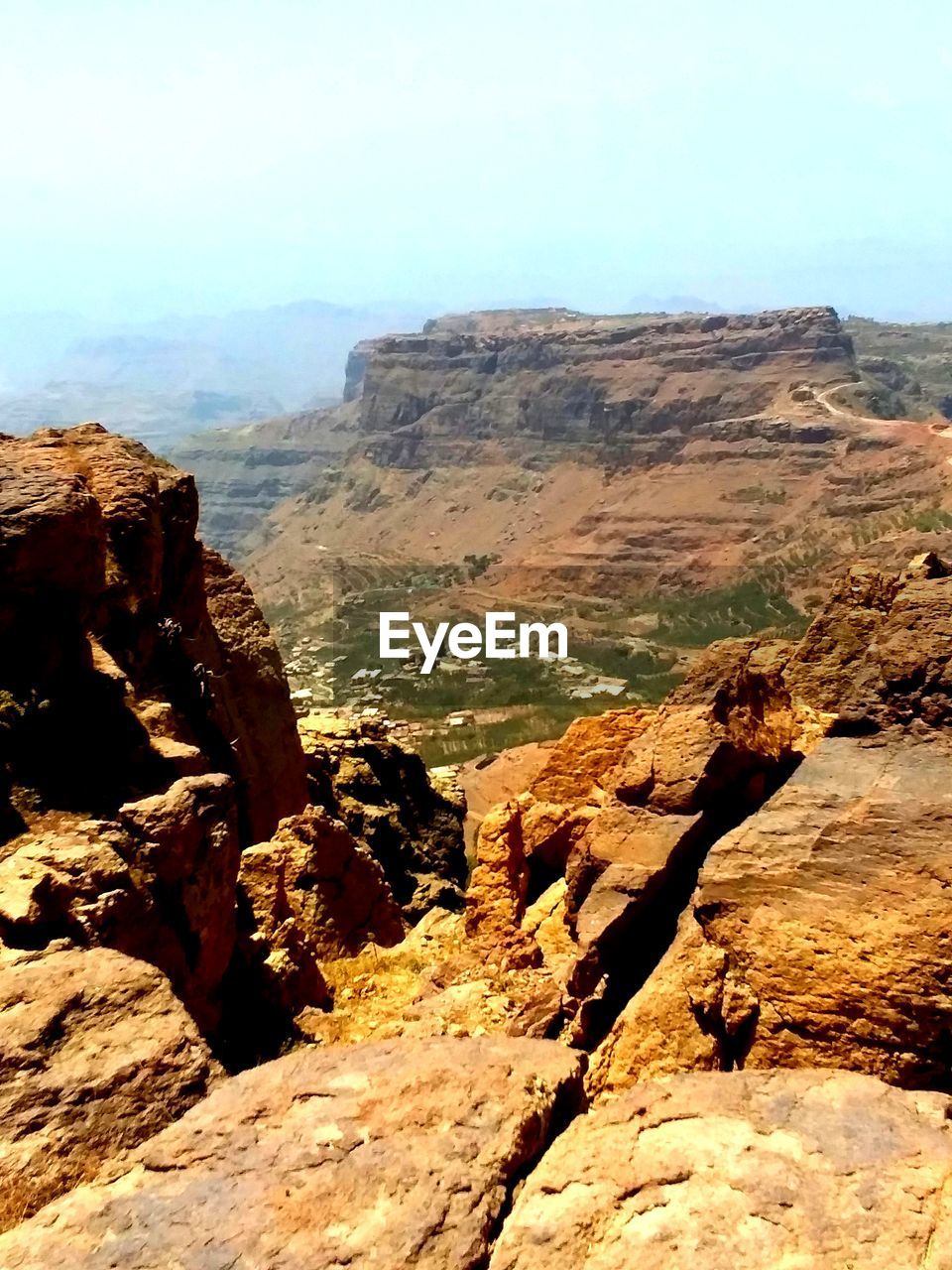 SCENIC VIEW OF ROCK FORMATION AGAINST SKY