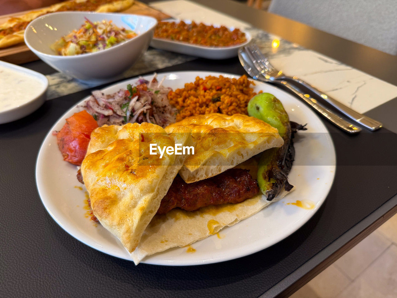 food, food and drink, plate, breakfast, table, meal, dish, healthy eating, freshness, fast food, meat, indoors, cuisine, no people, wellbeing, restaurant, brunch, vegetable, lunch, egg, serving size, bread, still life, high angle view, business, close-up, eating utensil