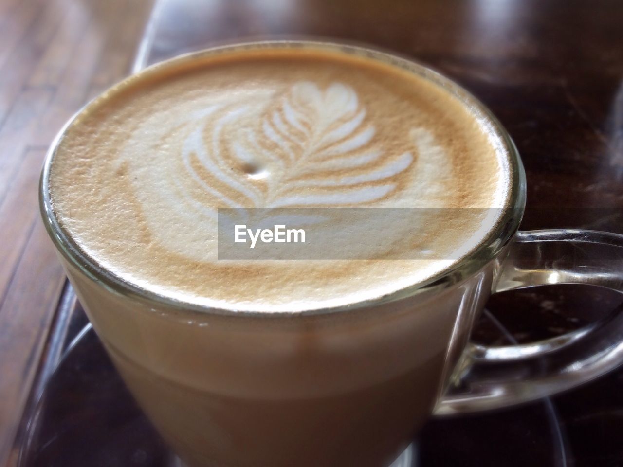 High angle view of cappuccino on table