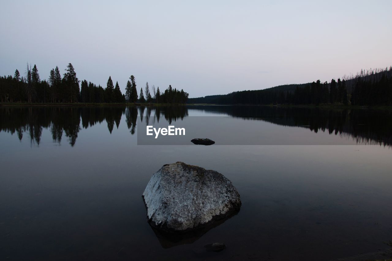 Scenic view of lake against clear sky