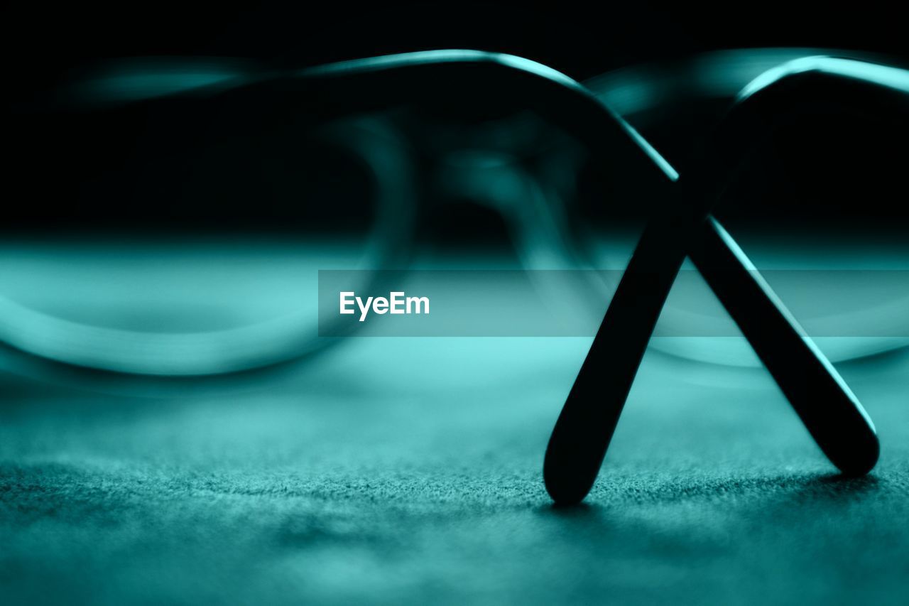 Close-up of sunglasses on table