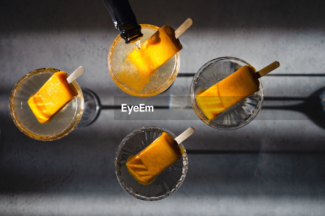 high angle view of drink in glass on table