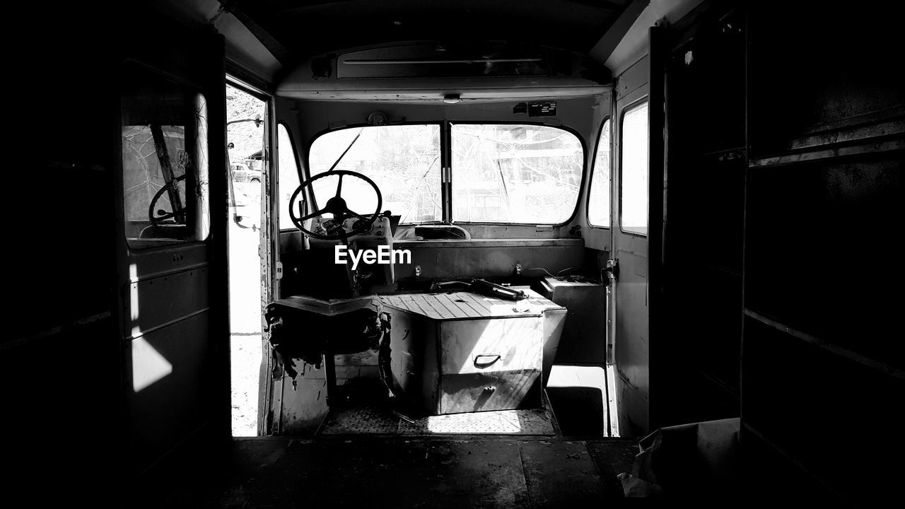 EMPTY SEATS IN ABANDONED ROOM