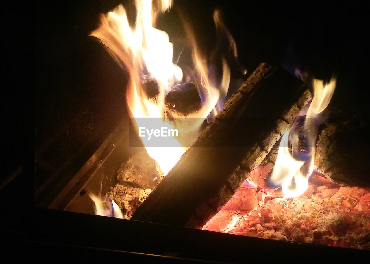 CLOSE-UP OF BONFIRE IN ILLUMINATED FIRE