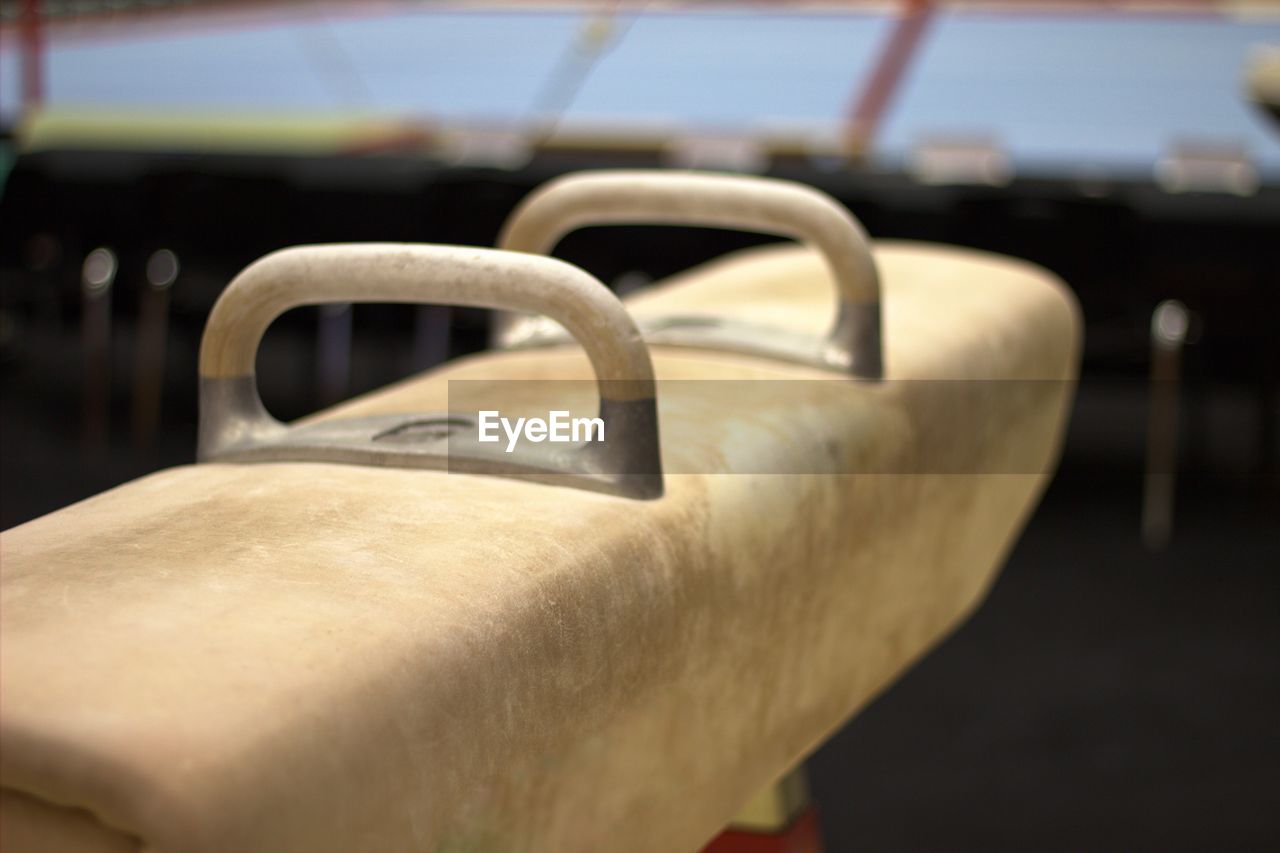 CLOSE-UP OF EYEGLASSES ON METAL