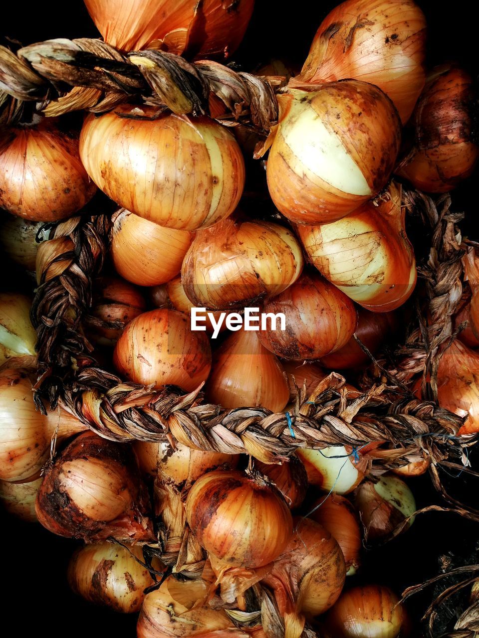 Full frame shot of onions for sale at market