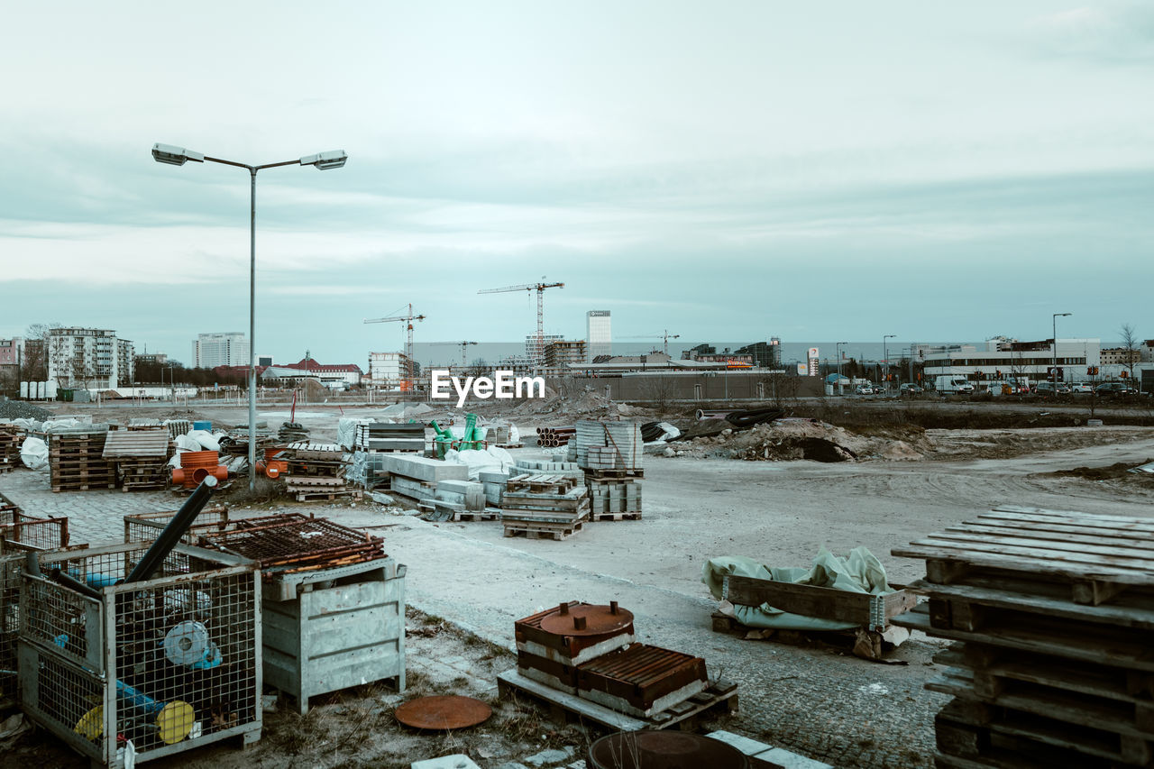 Equipment at construction site against sky