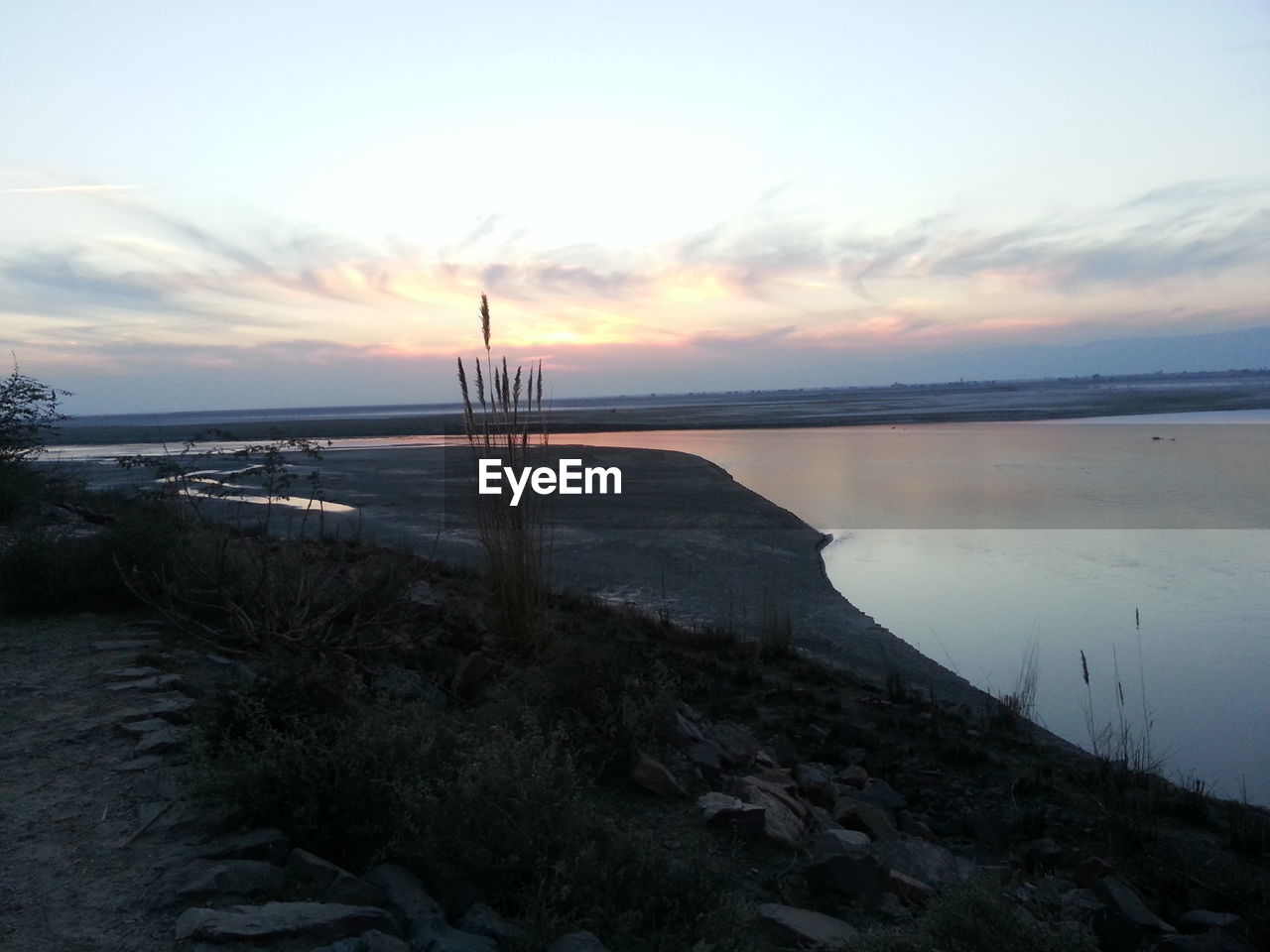 VIEW OF SEA AT SUNSET