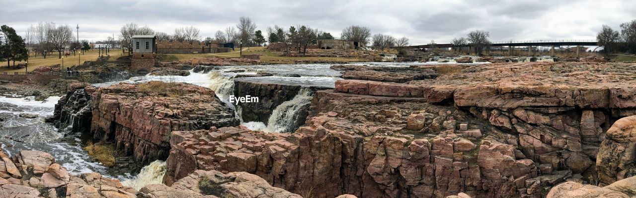 The big sioux river flows over rocks in sioux falls south dakota with views