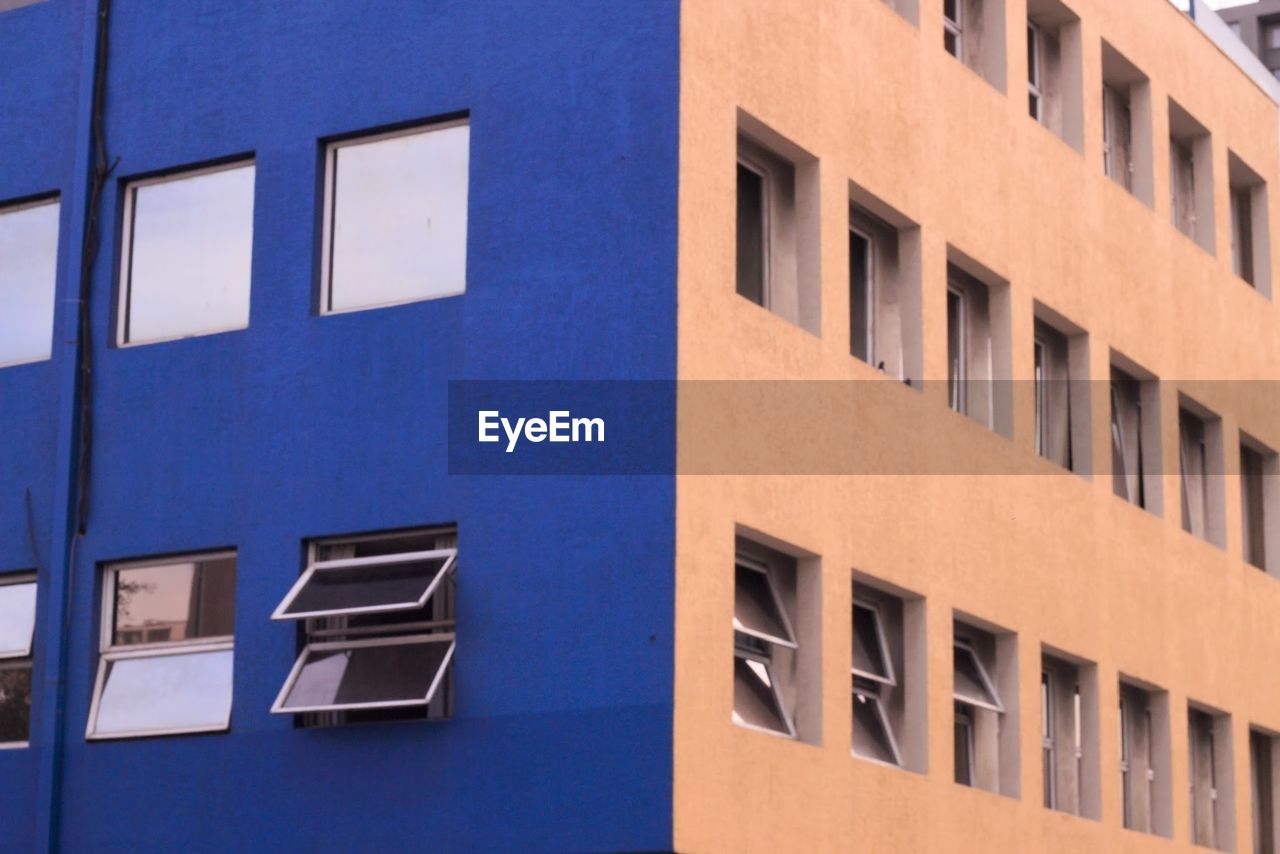 Low angle view of building with windows