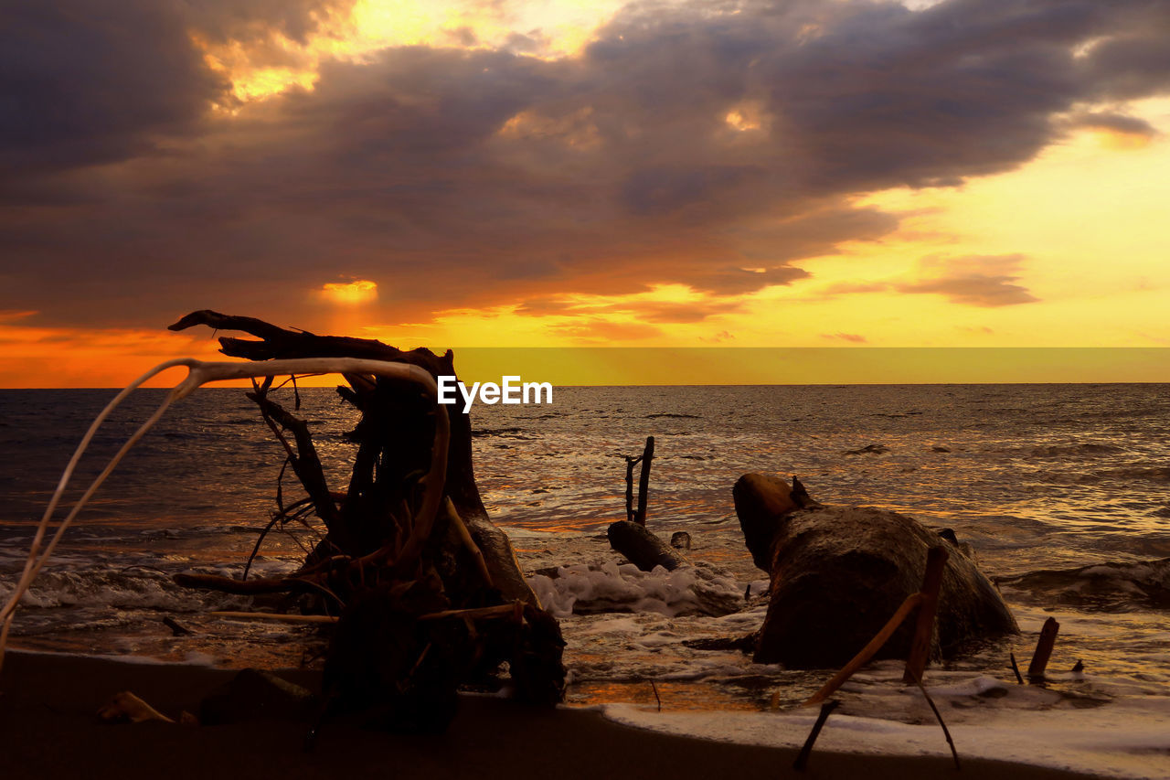 Scenic view of sea at sunset