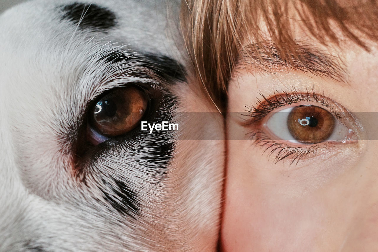 Close-up portrait of woman with dog