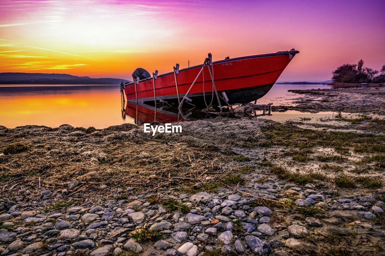 Boat on the lake shore of lake constance