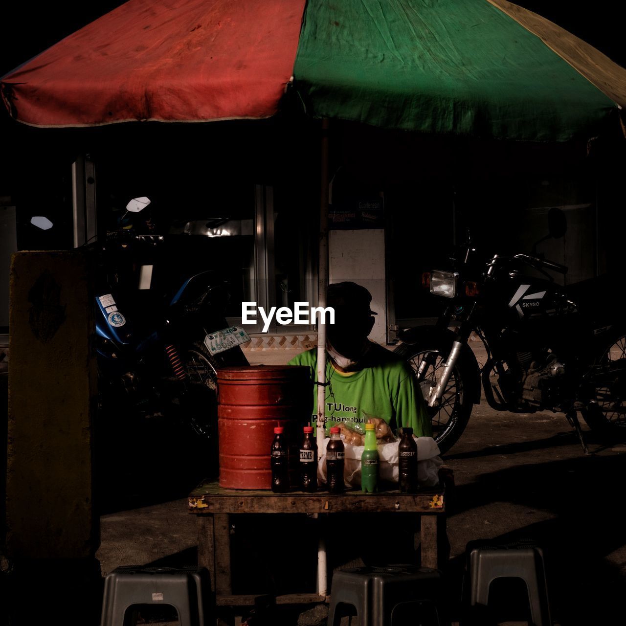 REAR VIEW OF PEOPLE AT RESTAURANT