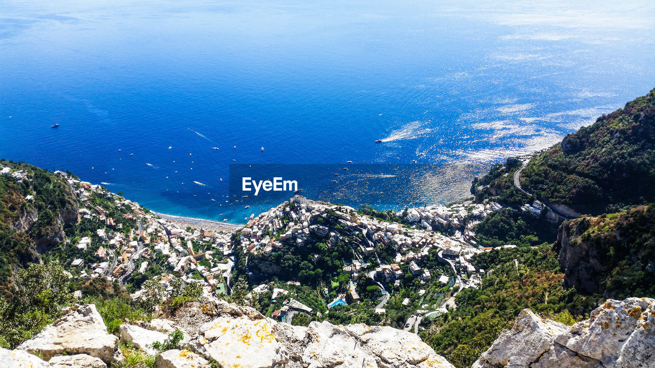 HIGH ANGLE VIEW OF SEA AND ROCKS