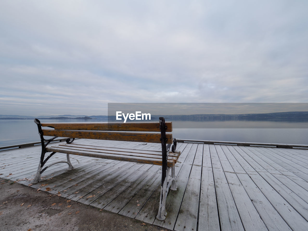 Pier over sea against sky