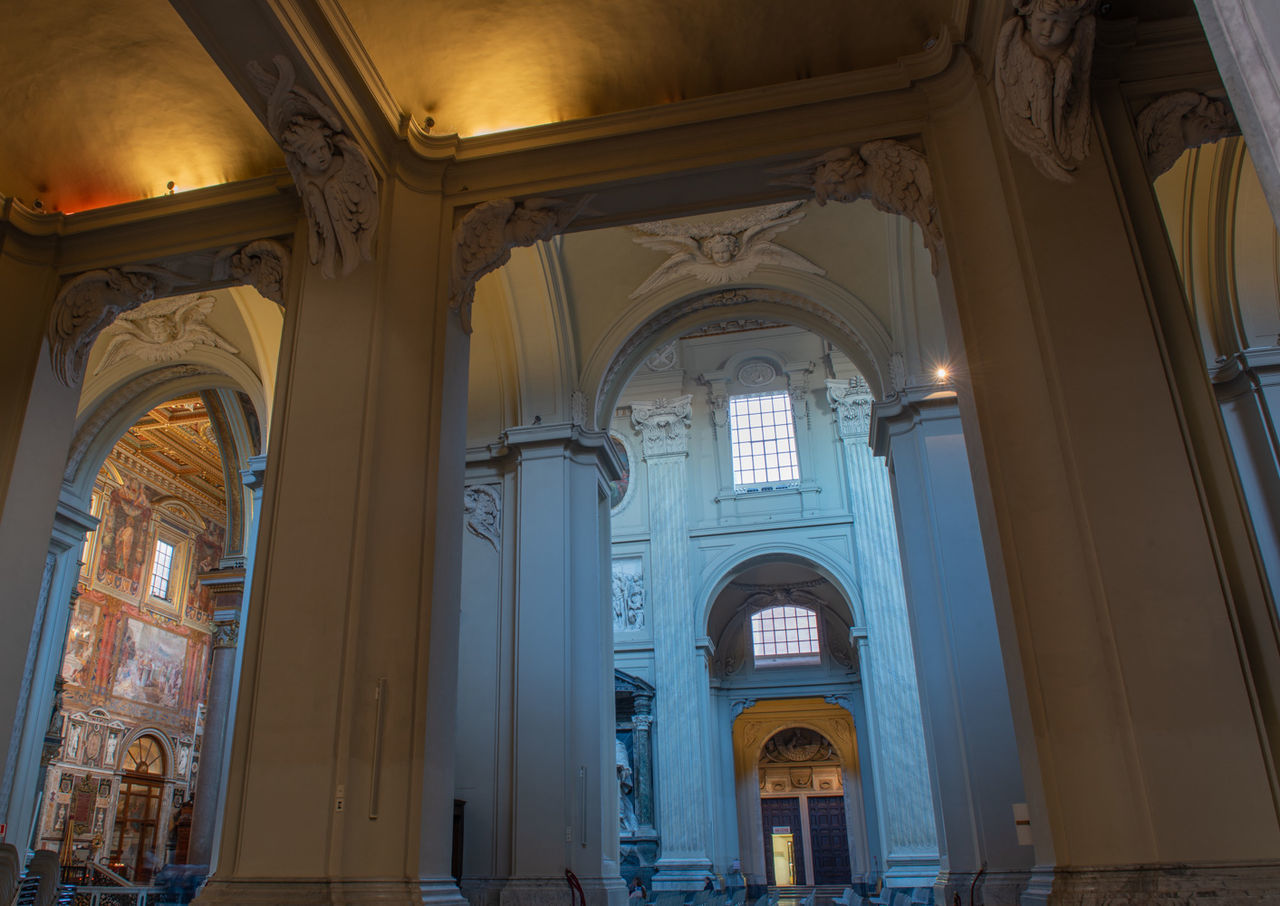 architecture, built structure, arch, building, religion, place of worship, belief, spirituality, indoors, travel destinations, history, architectural column, the past, catholicism, travel, no people, ceiling, worship, window, low angle view, tourism, column