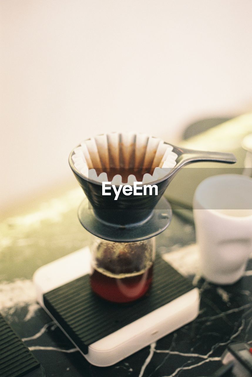 Close-up of coffee filter in container