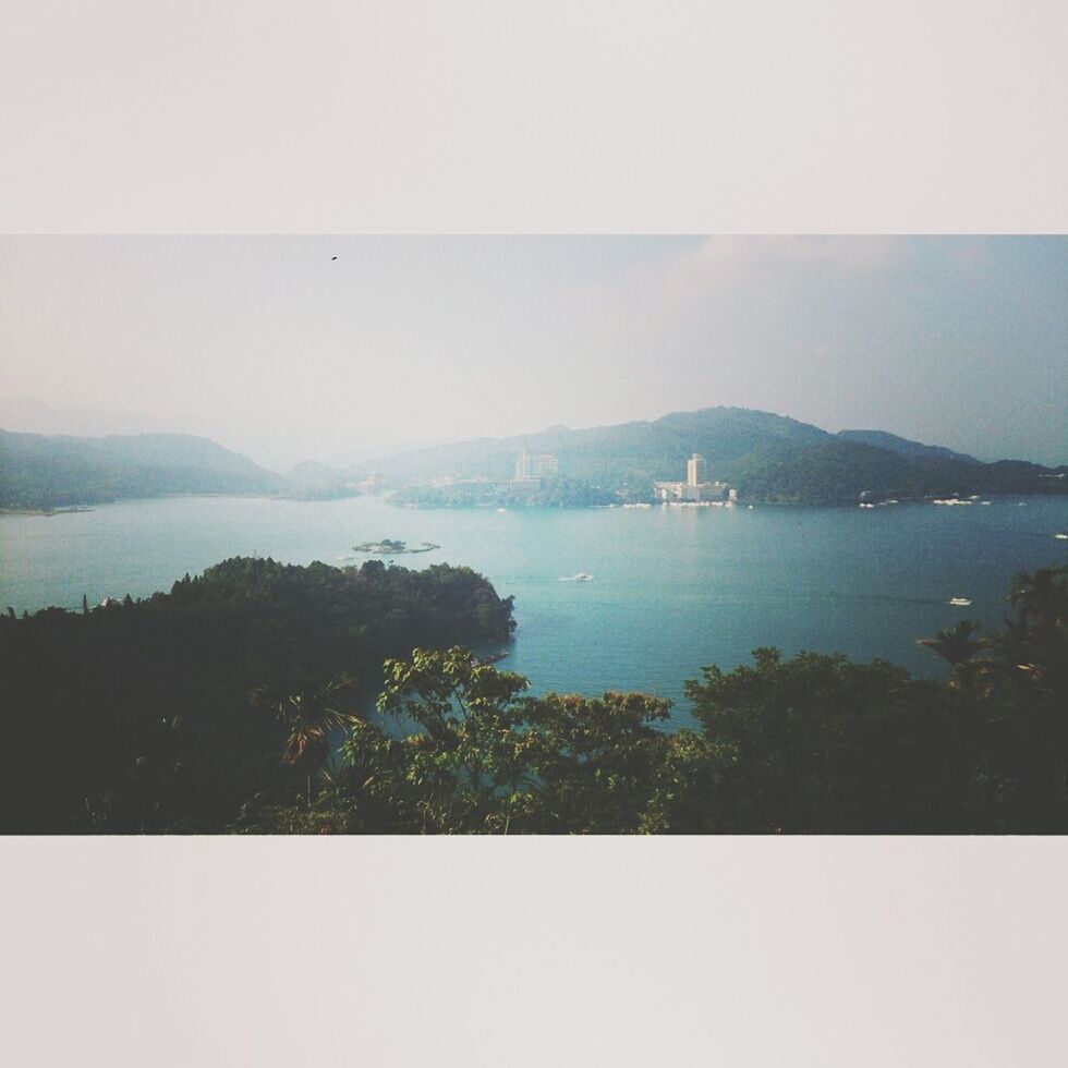 Scenic view of river and mountains