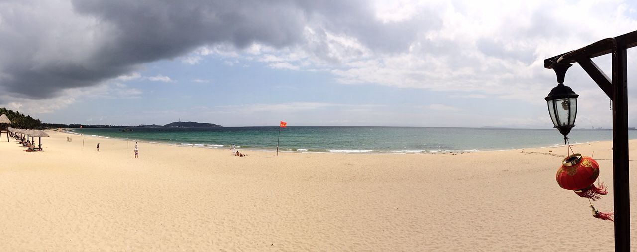 View of calm beach against the sky