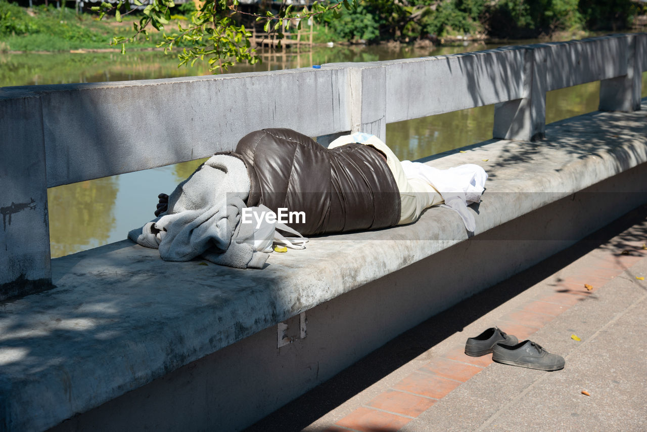 VIEW OF AN ANIMAL SLEEPING ON FLOOR